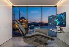 A photorealistic image of an empty, modern dental treatment room with advanced equipment. Through the large window, the blurred skyline of Istanbul, Turkey is visible at sunset, representing high-quality dental tourism.