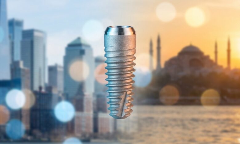 A photorealistic close-up of a titanium dental implant, with a split background featuring a blurred American city on one side and a warm, blurred view of Istanbul, Turkey on the other, representing a global comparison of dental treatment.