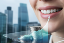 A conceptual image illustrating the intersection of dental health and financial planning, featuring a subtle healthy smile, generic metallic coins, and a blurred graph on a modern device, all set against a soft-focus urban cityscape hinting at the United Kingdom.