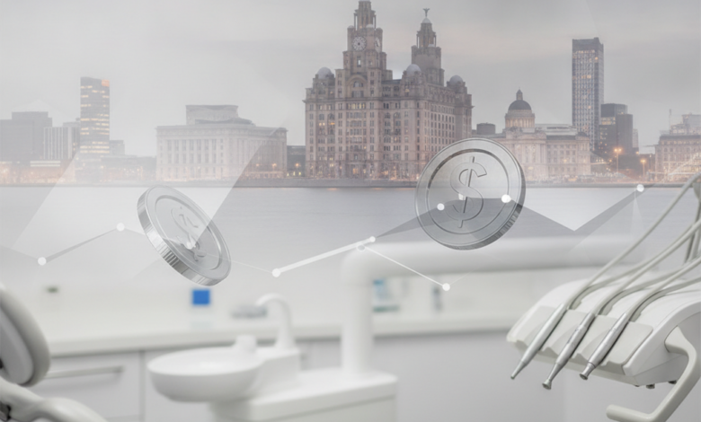 A soft focus image featuring the iconic Liver Building and Liverpool waterfront blurred in the background, with a clean, sterile dental clinic environment in the foreground. Abstract metallic shapes, resembling polished coins or geometric patterns, are subtly integrated, symbolizing the financial aspects of dental care.