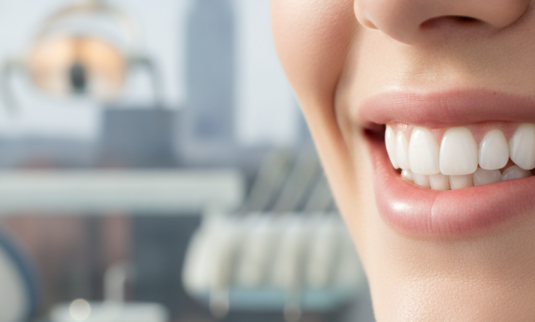 Close-up of a naturally bright, confident smile with perfectly whitened teeth, set against a softly blurred modern dental clinic interior and a distant, indistinct Manchester city skyline.